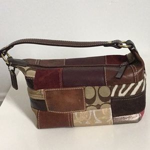 Interesting mini Coach purse with character